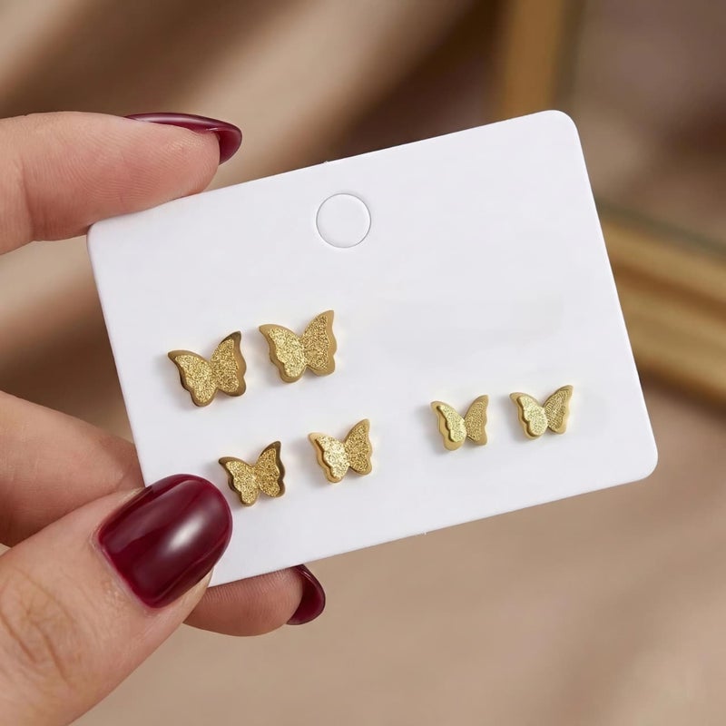 A set of 3 pairs of gold butterflies with a double design, made of rust-resistant stainless steel, with graduated sizes to give you layered styling or to choose the perfect size. - Image 5